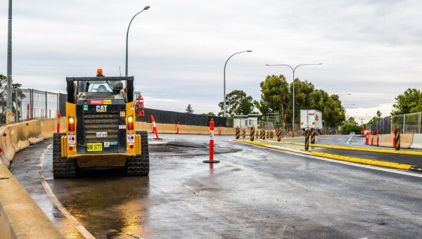 Lowering emissions through warm mix asphalt